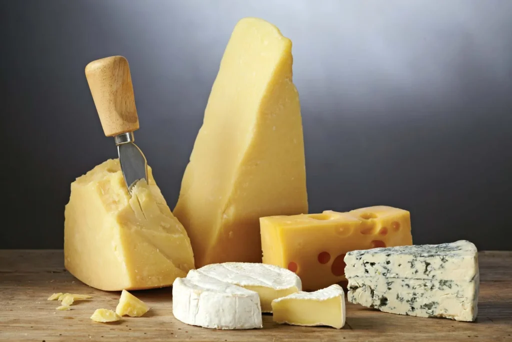 Cheese-assortment-Blue-cheese-swiss-Brie-parmesan.jpg
